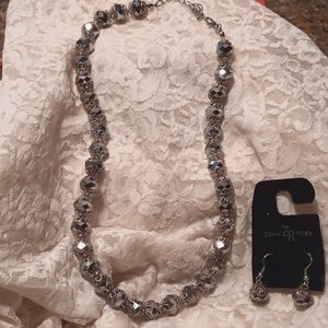 Dark gray crystal necklace and pierced earring set.